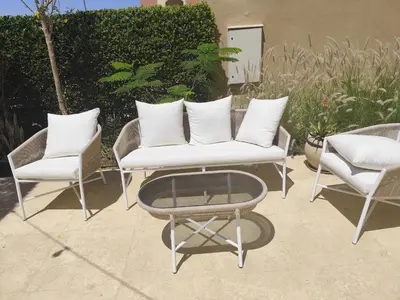 a group of chairs and a table on a patio at Villa Makadi Heights in Hurghada