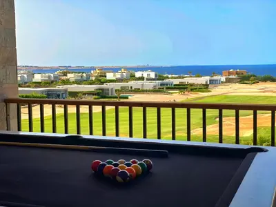a ping pong ball on a ping pong table at Soma Bay - Luxury 3 Bedroom Penthouse - Panoramic Sea View, Free Pool and Beach Access in Hurghada
