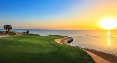 a view of a golf course with the ocean at Soma Bay - Luxury 3 Bedroom Penthouse - Panoramic Sea View, Free Pool and Beach Access in Hurghada