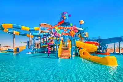 a water park with a water slide in the water at Soma Bay - Luxury 3 Bedroom Penthouse - Panoramic Sea View, Free Pool and Beach Access in Hurghada