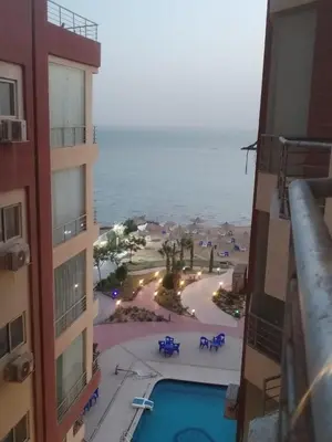 a view of a swimming pool from a building at Casablanca Beach hurgada كازابلانكا بيتش الغردقه in Hurghada
