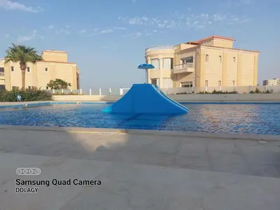 a blue object in the middle of a swimming pool at Selena bay resort in Hurghada