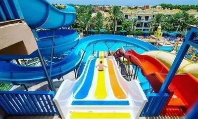 a water park with a water slide and a water park at شاليه في منتجع ميراج in Hurghada
