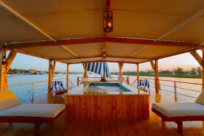 a hot tub on the deck of a boat at Turquoise Dahabiya , 3,4,7 nights sailing between Luxor and Aswan in Luxor