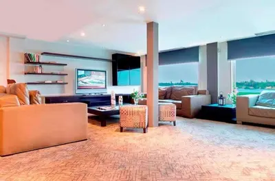 a living room with a couch and a table at Sofia Nile Cruise Luxor & Aswan in Luxor