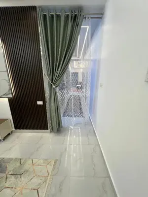 a room with a window and a curtain at Excellent residential unit in Shellal