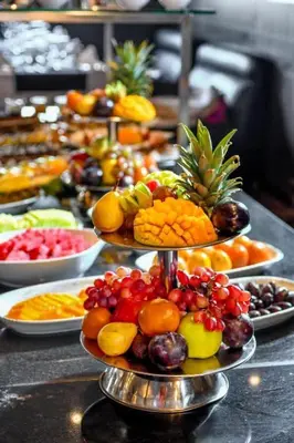 a bunch of different types of fruit on a table at Nile Cruise 3 Nights Aswan to Luxor Sightseeing Included in Nag` el-Ramla