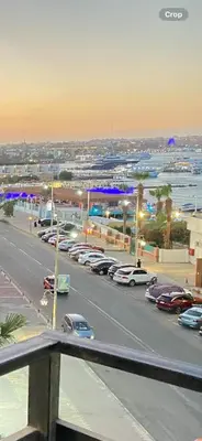 a view of a parking lot with cars parked at استديو فندقى على البحر كمبوند بريستيجا اول طلعة فلفله الشيراتون in Hurghada