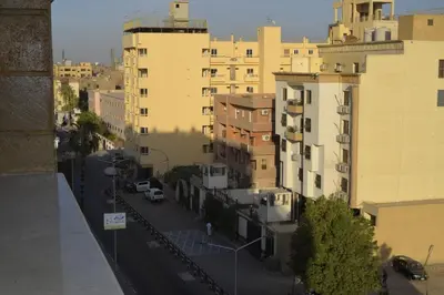 a view of a city street with tall buildings at برج النيل بزنس in Jazīrat al ‘Awwāmīyah