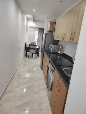 a kitchen with a sink and a dishwasher at Selena Bay Resort Chalet in Hurghada