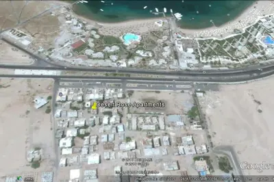 a map of a city with buildings and water at Desert Rose Apartment in Hurghada