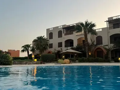 a hotel with a swimming pool in front of a building at El gouna , Red sea in Hurghada