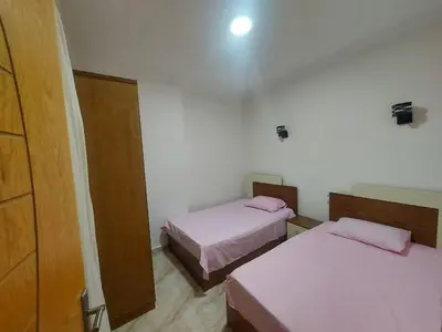 a room with two beds in a room at Golden key in Hurghada