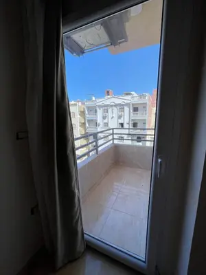 a view from the window of a balcony at Hadaba Studio in Hurghada