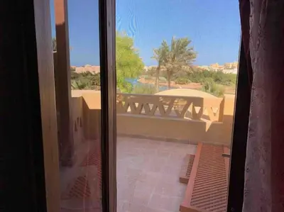 a view of a balcony with a view of the desert at Private Villa with heated pool and lagoon in Hurghada