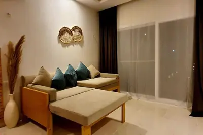 a living room with two couches and a window at Studio in Selena Bay Hurghada in Hurghada