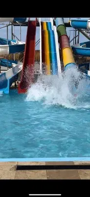 a group of slides in a swimming pool at Fanadir sea view Appartment in Hurghada