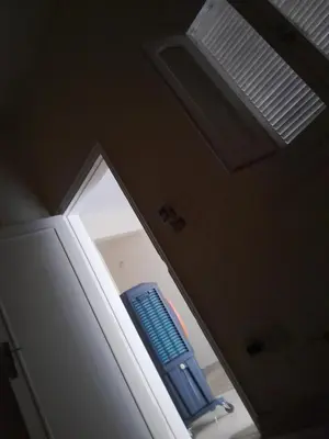 a door of a refrigerator with a blue object in it at Florence el khameseny in Sahl Hasheesh