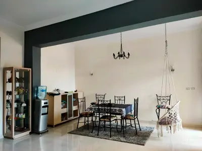 a dining room with a table and chairs at Lux Gardenhouse pool WiFi Private garden Hurghada in Hurghada
