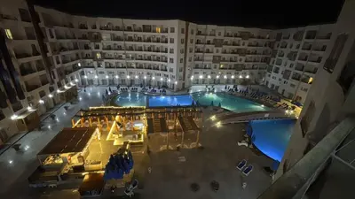an overhead view of a large building with a swimming pool at C'est la vie Golden in Hurghada