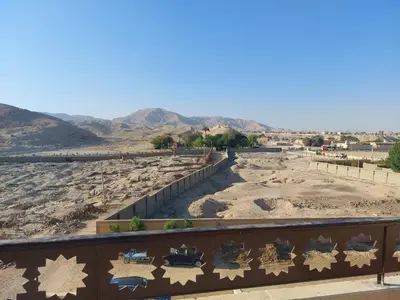 a view of the desert with mountains in the background at Carter Guesthouse Luxor 3 in Al Karnak