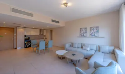a living room with a couch and a table at Luxury Stays in Mangroovy El Gouna in Hurghada