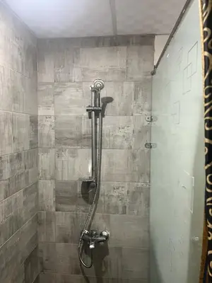 a shower with a glass door in a bathroom at scandic resort in Hurghada