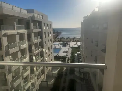 a view of the ocean from between two buildings at scandic resort in Hurghada