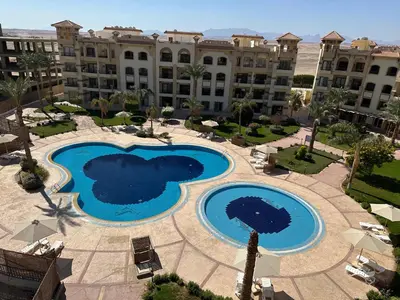 an overhead view of a pool in a resort at Al Saraya Sahl Hasheesh by Peaks in Hurghada