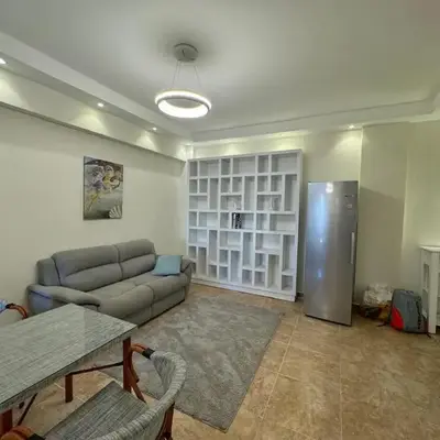A one-bedroom apartment with a compact terrace