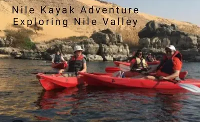 a group of people in kayaks on the water at Nile Kaiak Adventure in Aswan