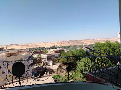 a view of a city from a balcony at Nubian Mood in Naj‘ al Maḩaţţah