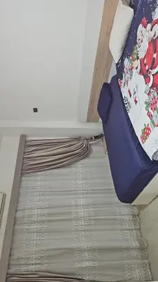 a bed in a room with a blanket and a mattress at Hurghada red ruby in Hurghada