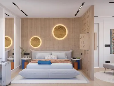 a bedroom with a large white bed and two round mirrors at Nefertem Yacht, All-Inclusive Boutique Charter in Luxor