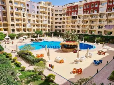 a large apartment complex with a large swimming pool at Florenza khamsin Apartment in Hurghada