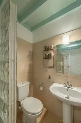 a bathroom with a toilet and a sink at Luxury apartment on the Marina in Hurghada