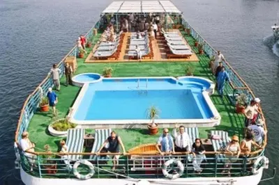 a group of people on a boat in the water at Nile Cruise 3 nights From Aswan to Luxor in Aswan