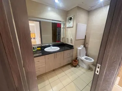 a bathroom with a sink and a toilet at Galaxy Aldau heights 2 bedrooms in Hurghada