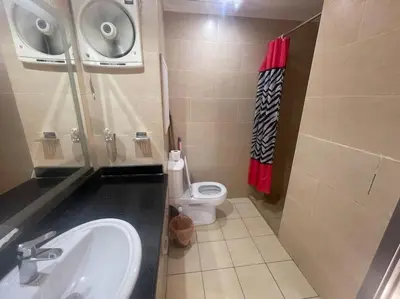 a bathroom with a sink and a toilet at Galaxy Aldau heights 2 bedrooms in Hurghada