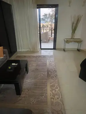 a living room with a couch and a coffee table at The view in Hurghada