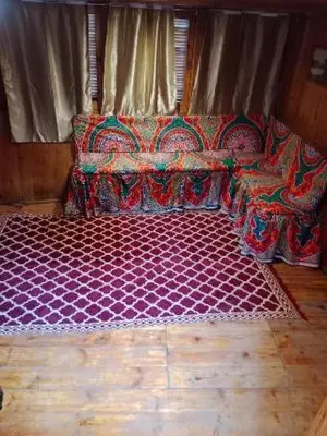 a couch in the back of a room at Nubian Sandal in Aswan