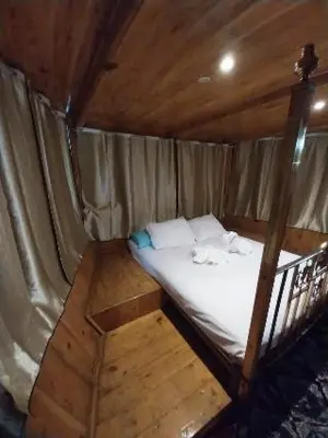 a bed in a room in a tent at Nubian Sandal in Aswan
