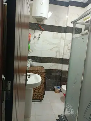 a bathroom with a sink and a toilet at Appartment in Hurghada in Hurghada