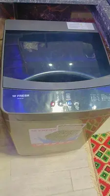 a video game console sitting on top of a table at اهلا بيكم في بيتنا in Jazīrat al ‘Awwāmīyah