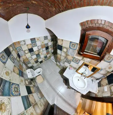 an overhead view of a bathroom with a sink and a mirror at Sheherazade Hotel Nile Villa in Luxor