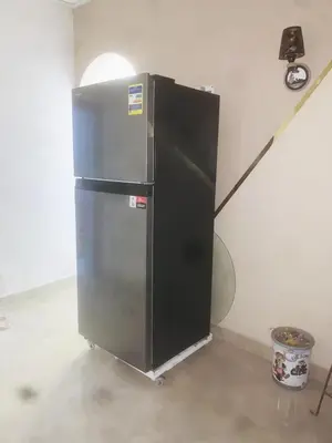 a black and silver refrigerator in a room at Nubian rise in Aswan