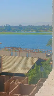 a view of a large body of water at اهلا بيكم في بيتنا in Jazīrat al ‘Awwāmīyah