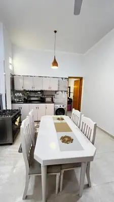 a white table and chairs in a kitchen at Seti house in Luxor