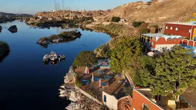 an aerial view of a river with boats in it at Nubiano Cataract in Shellal