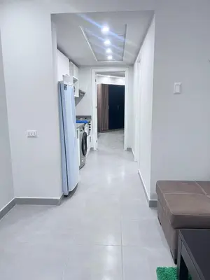 a hallway with a refrigerator in a room at Scandic Hotel Hurghada in Hurghada